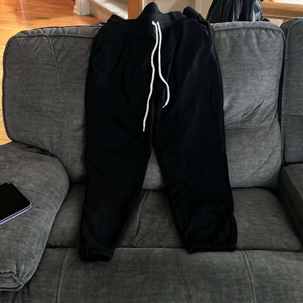 Brand new workout tags black elastic ankle sweatpants size XL.